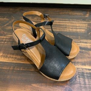 Black wedge sandal.